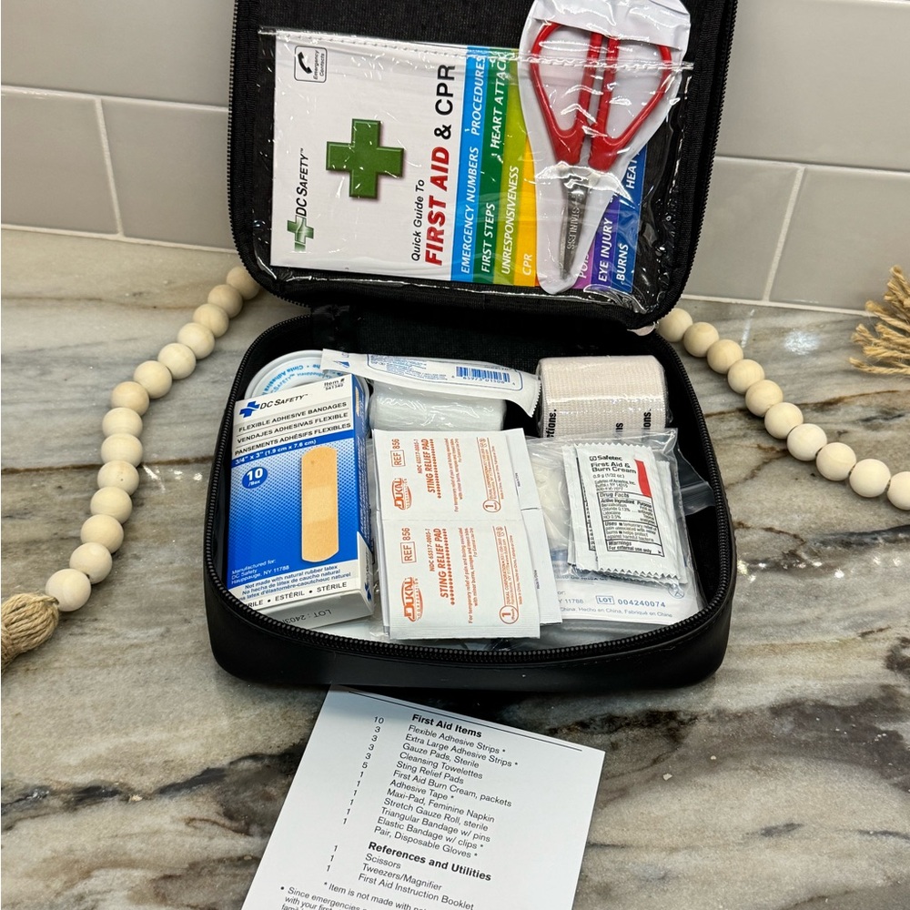 New 36pc Nissan Velcro loaded first aid supplies kit